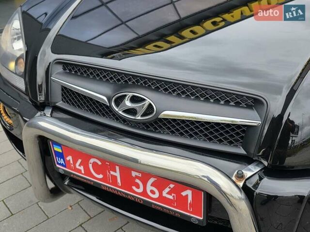 Чорний Хендай Туксон, об'ємом двигуна 2 л та пробігом 93 тис. км за 9750 $, фото 42 на Automoto.ua