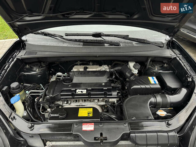 Черный Хендай Туксон, объемом двигателя 1.98 л и пробегом 202 тыс. км за 7650 $, фото 16 на Automoto.ua