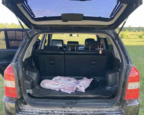 Чорний Хендай Туксон, об'ємом двигуна 2.66 л та пробігом 120 тис. км за 8500 $, фото 13 на Automoto.ua