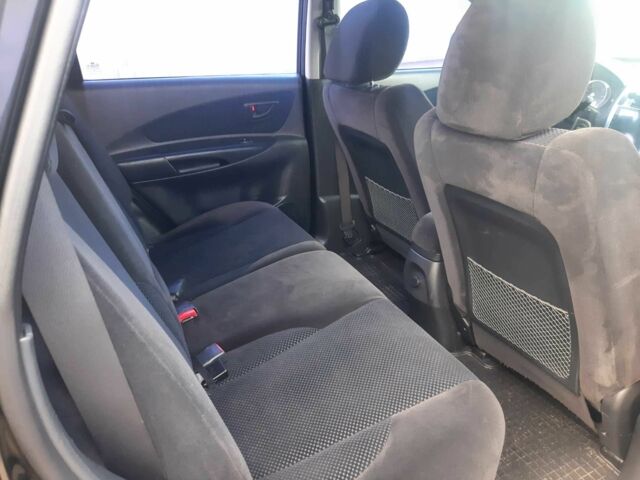 Чорний Хендай Туксон, об'ємом двигуна 2 л та пробігом 130 тис. км за 9200 $, фото 10 на Automoto.ua