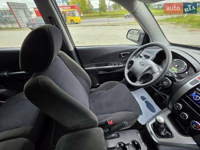Чорний Хендай Туксон, об'ємом двигуна 2 л та пробігом 93 тис. км за 9750 $, фото 99 на Automoto.ua