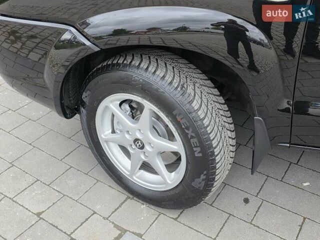 Чорний Хендай Туксон, об'ємом двигуна 2 л та пробігом 93 тис. км за 9750 $, фото 17 на Automoto.ua