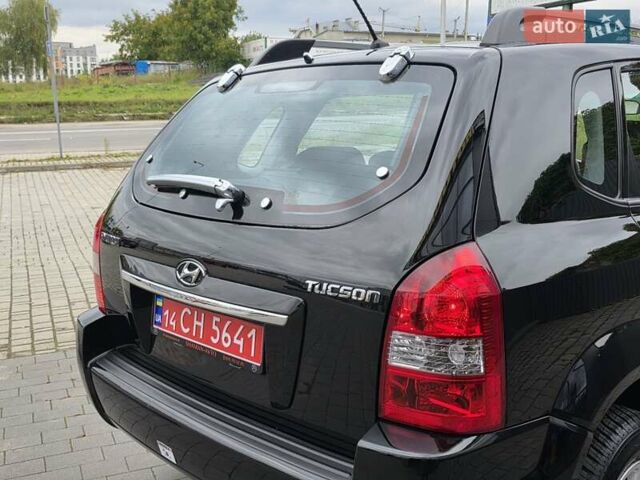 Чорний Хендай Туксон, об'ємом двигуна 2 л та пробігом 93 тис. км за 9750 $, фото 30 на Automoto.ua