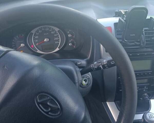 Черный Хендай Туксон, объемом двигателя 1.98 л и пробегом 298 тыс. км за 9300 $, фото 10 на Automoto.ua