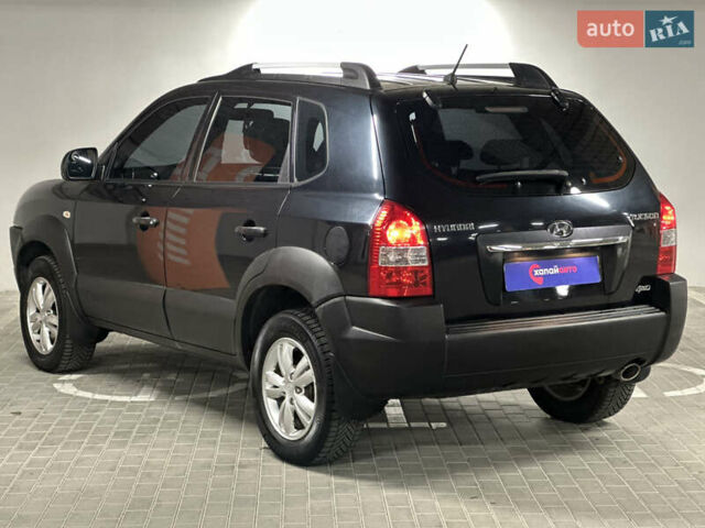 Черный Хендай Туксон, объемом двигателя 1.98 л и пробегом 129 тыс. км за 10600 $, фото 6 на Automoto.ua