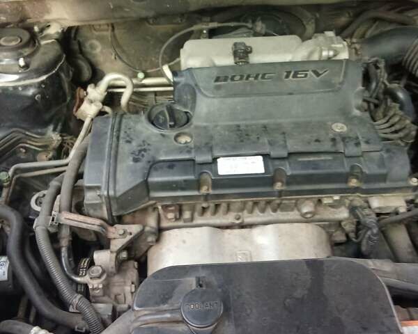 Черный Хендай Туксон, объемом двигателя 1.98 л и пробегом 298 тыс. км за 9300 $, фото 25 на Automoto.ua