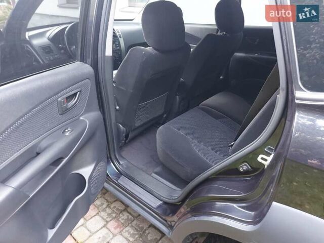 Черный Хендай Туксон, объемом двигателя 1.98 л и пробегом 125 тыс. км за 9200 $, фото 7 на Automoto.ua