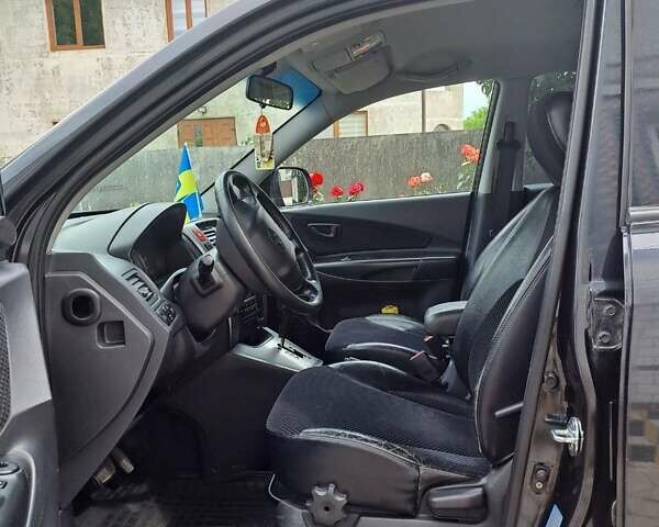 Чорний Хендай Туксон, об'ємом двигуна 1.98 л та пробігом 253 тис. км за 8500 $, фото 7 на Automoto.ua