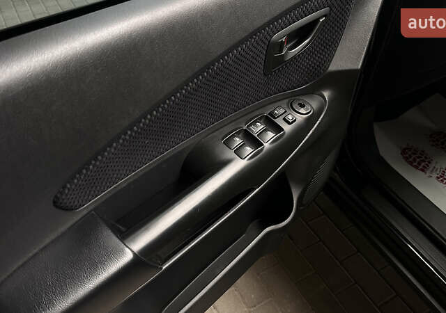 Черный Хендай Туксон, объемом двигателя 1.98 л и пробегом 129 тыс. км за 10600 $, фото 9 на Automoto.ua