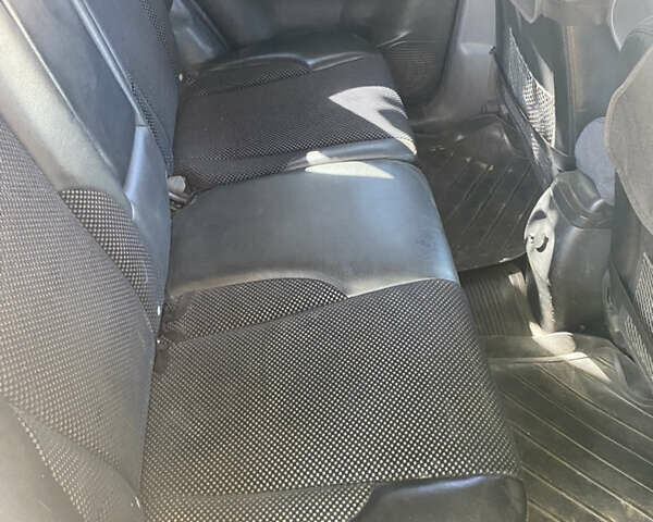 Черный Хендай Туксон, объемом двигателя 1.98 л и пробегом 245 тыс. км за 9000 $, фото 6 на Automoto.ua