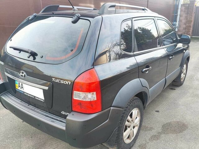 Чорний Хендай Туксон, об'ємом двигуна 2 л та пробігом 387 тис. км за 7000 $, фото 5 на Automoto.ua