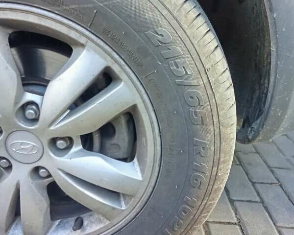 Черный Хендай Туксон, объемом двигателя 1.98 л и пробегом 298 тыс. км за 9300 $, фото 14 на Automoto.ua