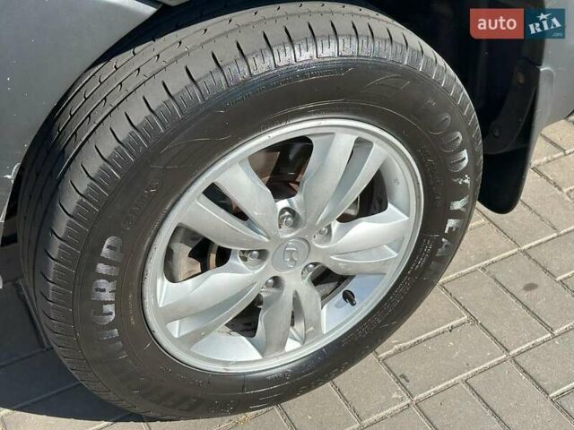 Черный Хендай Туксон, объемом двигателя 2 л и пробегом 255 тыс. км за 9290 $, фото 7 на Automoto.ua