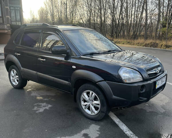 Чорний Хендай Туксон, об'ємом двигуна 1.98 л та пробігом 180 тис. км за 7950 $, фото 6 на Automoto.ua