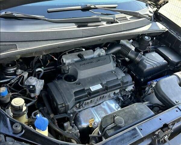 Черный Хендай Туксон, объемом двигателя 1.98 л и пробегом 186 тыс. км за 9500 $, фото 3 на Automoto.ua