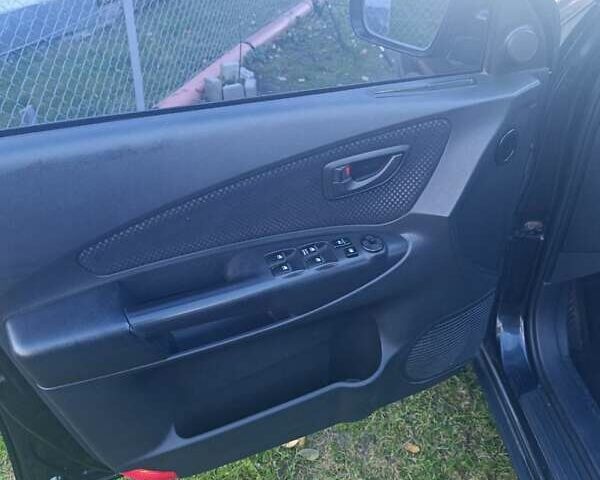 Черный Хендай Туксон, объемом двигателя 1.98 л и пробегом 298 тыс. км за 9300 $, фото 11 на Automoto.ua