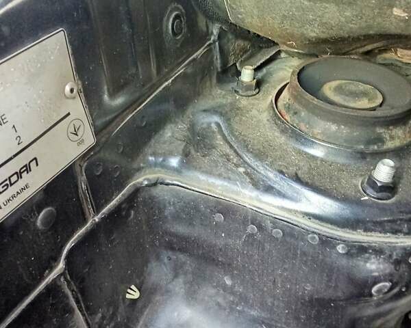 Черный Хендай Туксон, объемом двигателя 1.98 л и пробегом 298 тыс. км за 9300 $, фото 26 на Automoto.ua