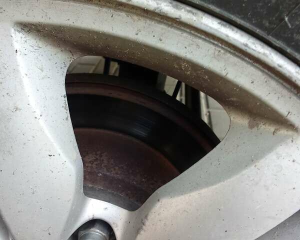 Черный Хендай Туксон, объемом двигателя 1.98 л и пробегом 298 тыс. км за 9300 $, фото 20 на Automoto.ua