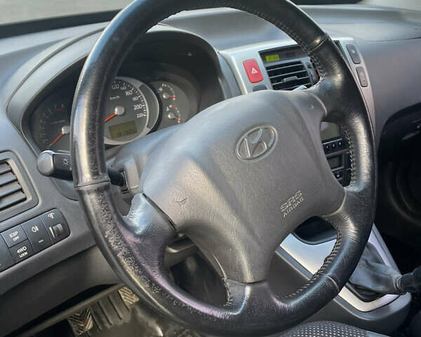 Чорний Хендай Туксон, об'ємом двигуна 1.98 л та пробігом 180 тис. км за 7950 $, фото 13 на Automoto.ua