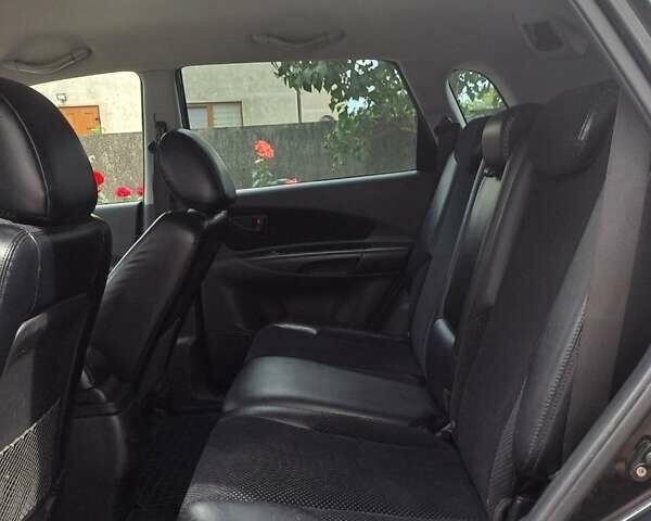 Чорний Хендай Туксон, об'ємом двигуна 1.98 л та пробігом 253 тис. км за 8500 $, фото 1 на Automoto.ua