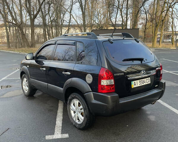 Чорний Хендай Туксон, об'ємом двигуна 1.98 л та пробігом 180 тис. км за 7950 $, фото 9 на Automoto.ua