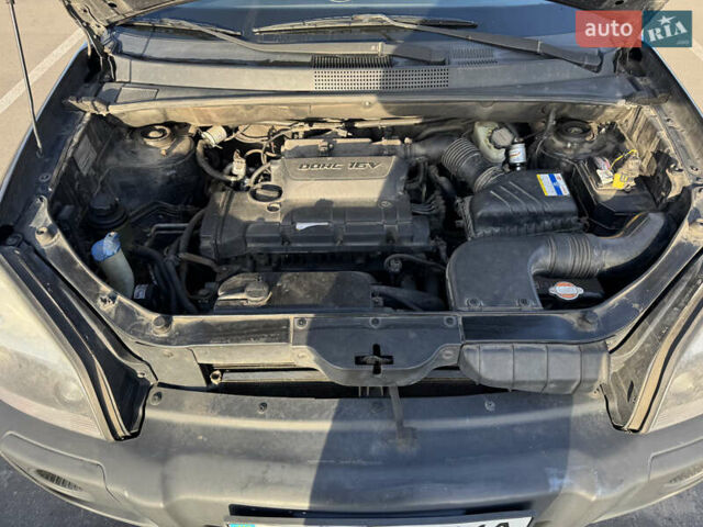 Черный Хендай Туксон, объемом двигателя 1.98 л и пробегом 218 тыс. км за 9350 $, фото 11 на Automoto.ua