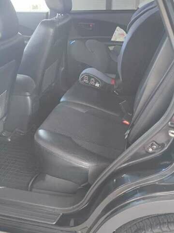 Черный Хендай Туксон, объемом двигателя 2 л и пробегом 141 тыс. км за 8500 $, фото 1 на Automoto.ua