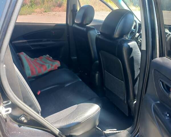 Чорний Хендай Туксон, об'ємом двигуна 1.98 л та пробігом 132 тис. км за 9200 $, фото 2 на Automoto.ua