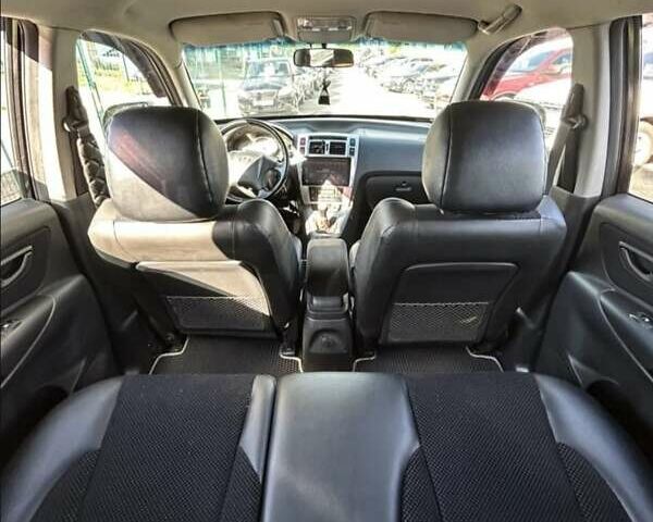 Черный Хендай Туксон, объемом двигателя 1.98 л и пробегом 186 тыс. км за 9500 $, фото 15 на Automoto.ua