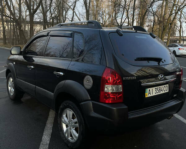 Чорний Хендай Туксон, об'ємом двигуна 1.98 л та пробігом 180 тис. км за 7950 $, фото 7 на Automoto.ua