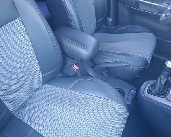 Черный Хендай Туксон, объемом двигателя 1.98 л и пробегом 298 тыс. км за 9300 $, фото 9 на Automoto.ua