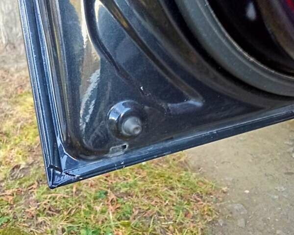 Черный Хендай Туксон, объемом двигателя 1.98 л и пробегом 298 тыс. км за 9300 $, фото 22 на Automoto.ua