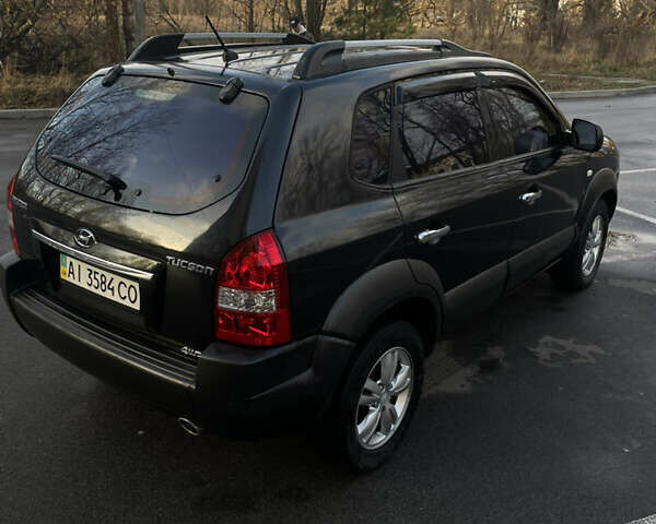 Чорний Хендай Туксон, об'ємом двигуна 1.98 л та пробігом 180 тис. км за 7950 $, фото 8 на Automoto.ua
