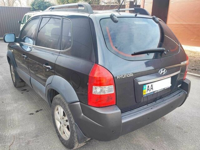 Чорний Хендай Туксон, об'ємом двигуна 2 л та пробігом 387 тис. км за 7000 $, фото 6 на Automoto.ua