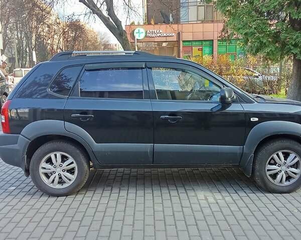 Черный Хендай Туксон, объемом двигателя 1.98 л и пробегом 298 тыс. км за 9300 $, фото 16 на Automoto.ua