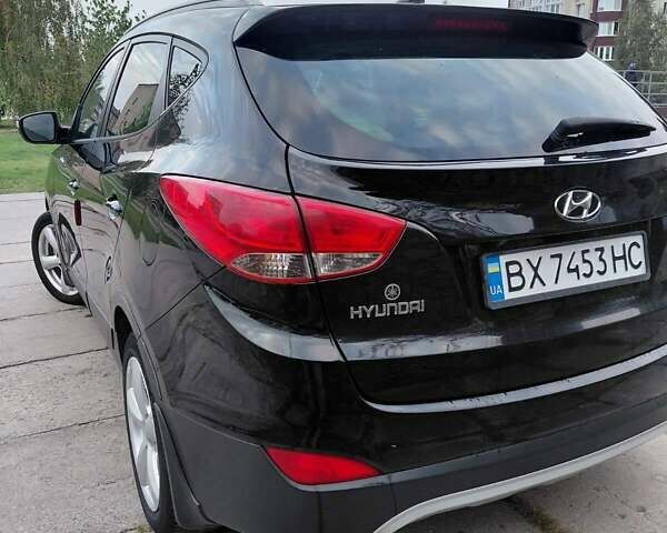 Черный Хендай Туксон, объемом двигателя 2 л и пробегом 251 тыс. км за 12500 $, фото 8 на Automoto.ua