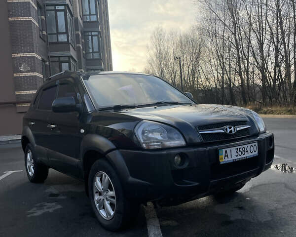 Чорний Хендай Туксон, об'ємом двигуна 1.98 л та пробігом 180 тис. км за 7950 $, фото 5 на Automoto.ua