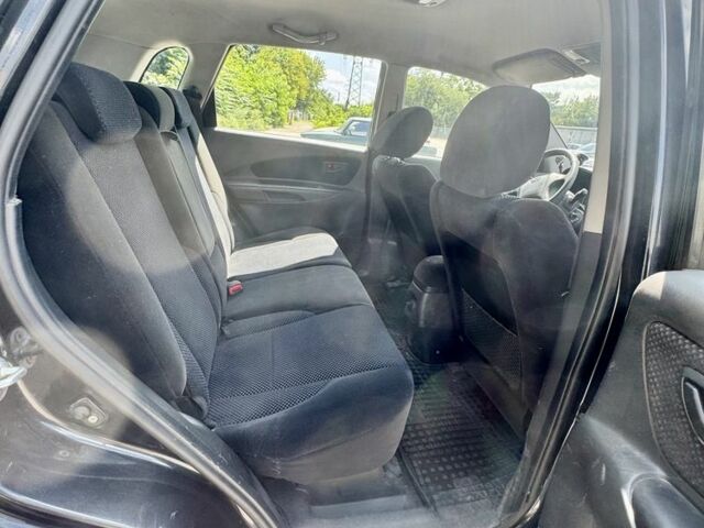 Чорний Хендай Туксон, об'ємом двигуна 2 л та пробігом 260 тис. км за 5500 $, фото 12 на Automoto.ua