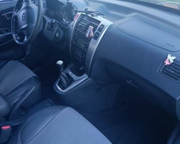 Черный Хендай Туксон, объемом двигателя 1.98 л и пробегом 298 тыс. км за 9300 $, фото 12 на Automoto.ua