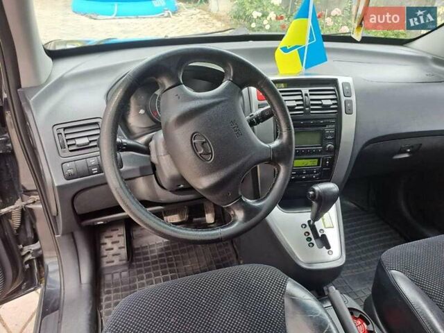 Чорний Хендай Туксон, об'ємом двигуна 1.98 л та пробігом 253 тис. км за 8500 $, фото 8 на Automoto.ua