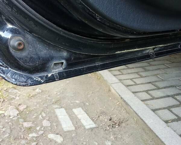 Черный Хендай Туксон, объемом двигателя 1.98 л и пробегом 298 тыс. км за 9300 $, фото 24 на Automoto.ua