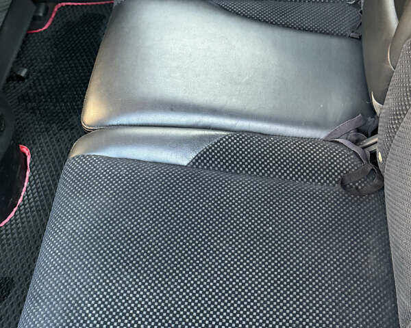 Черный Хендай Туксон, объемом двигателя 1.98 л и пробегом 218 тыс. км за 9350 $, фото 8 на Automoto.ua