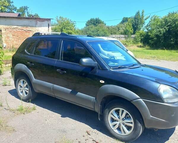 Чорний Хендай Туксон, об'ємом двигуна 1.98 л та пробігом 132 тис. км за 9200 $, фото 8 на Automoto.ua