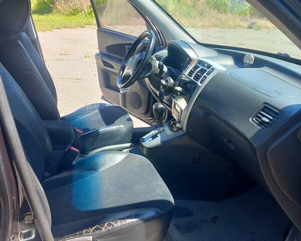 Чорний Хендай Туксон, об'ємом двигуна 1.98 л та пробігом 132 тис. км за 9200 $, фото 4 на Automoto.ua