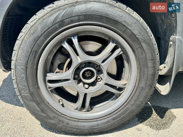 Черный Хендай Туксон, объемом двигателя 1.98 л и пробегом 252 тыс. км за 7999 $, фото 8 на Automoto.ua