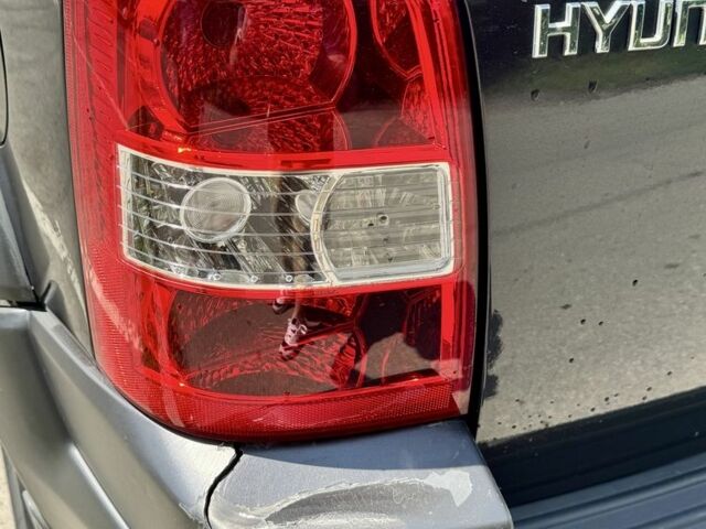 Чорний Хендай Туксон, об'ємом двигуна 2 л та пробігом 260 тис. км за 5500 $, фото 7 на Automoto.ua