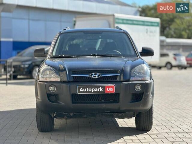 Черный Хендай Туксон, объемом двигателя 2 л и пробегом 255 тыс. км за 9290 $, фото 1 на Automoto.ua