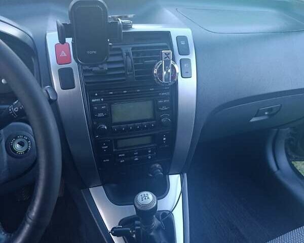 Черный Хендай Туксон, объемом двигателя 1.98 л и пробегом 298 тыс. км за 9300 $, фото 7 на Automoto.ua