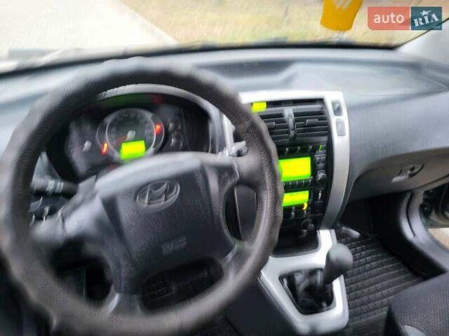 Чорний Хендай Туксон, об'ємом двигуна 1.98 л та пробігом 160 тис. км за 10300 $, фото 100 на Automoto.ua