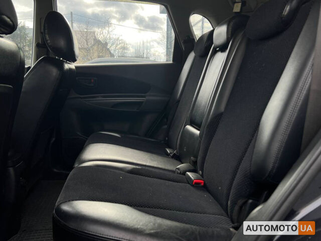 Черный Хендай Туксон, объемом двигателя 2 л и пробегом 178 тыс. км за 9600 $, фото 20 на Automoto.ua
